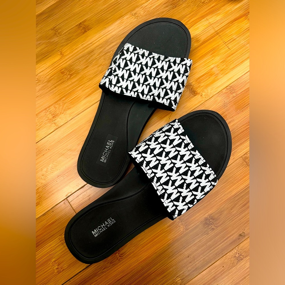 Gently used Michael Kors slides.
